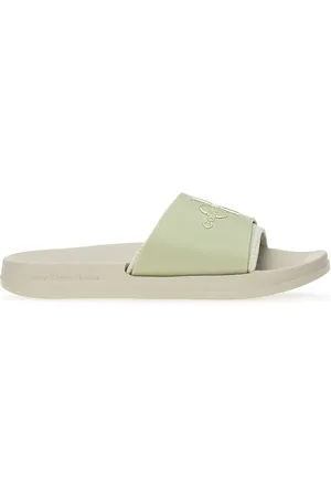 Calvin Klein Klapki Slide Monogram TPU YW0YW00585-0F4